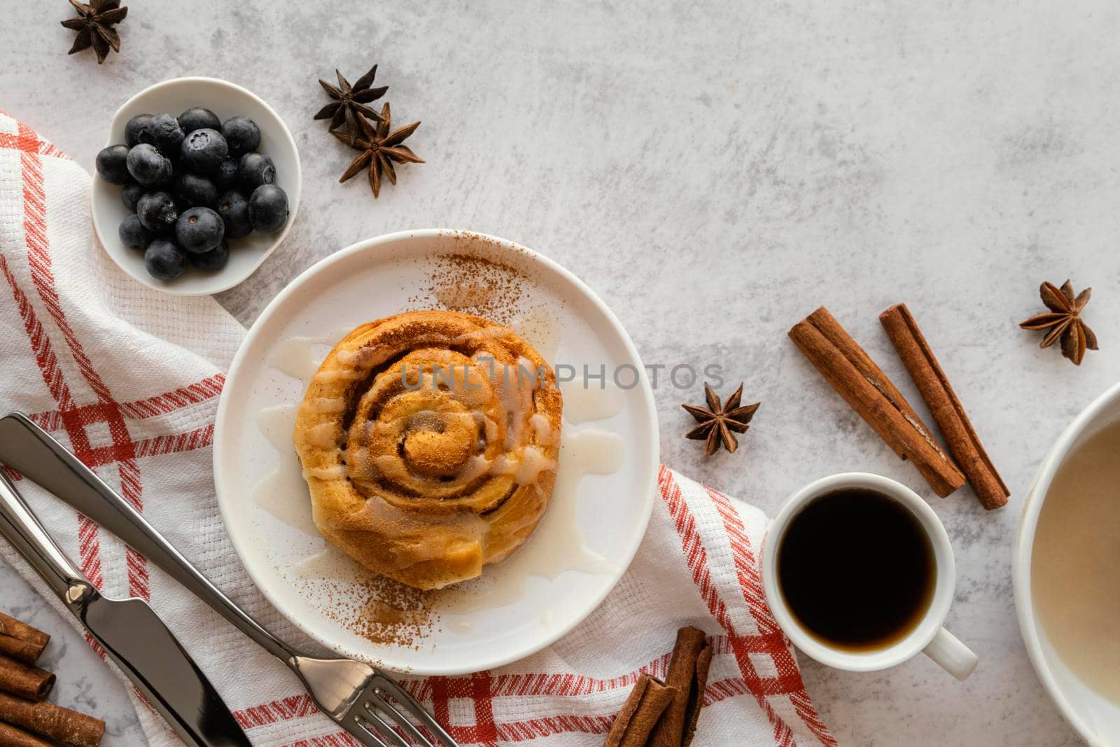 top view cinnamon roll blueberries by Zahard