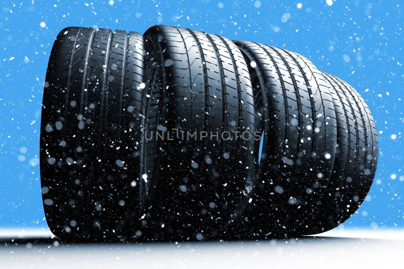 Four car tires rolling on a snow covered road with a blue background, 3d illustration