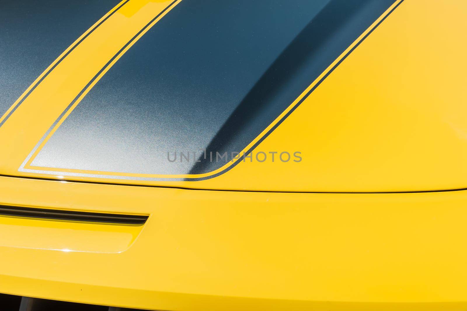 Close up of hood of a yellow sport car by cla78