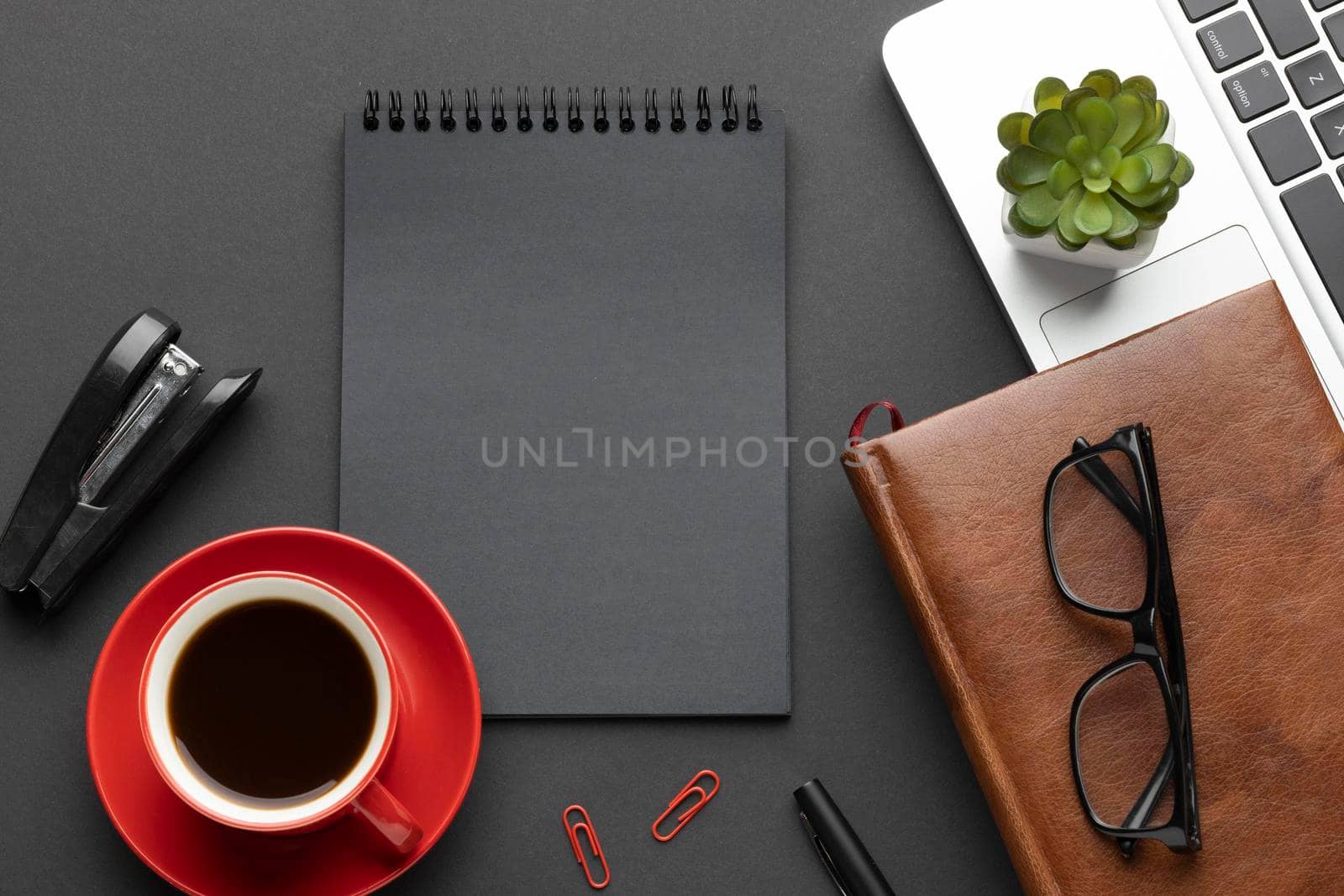 arrangement office elements dark background with notepad by Zahard