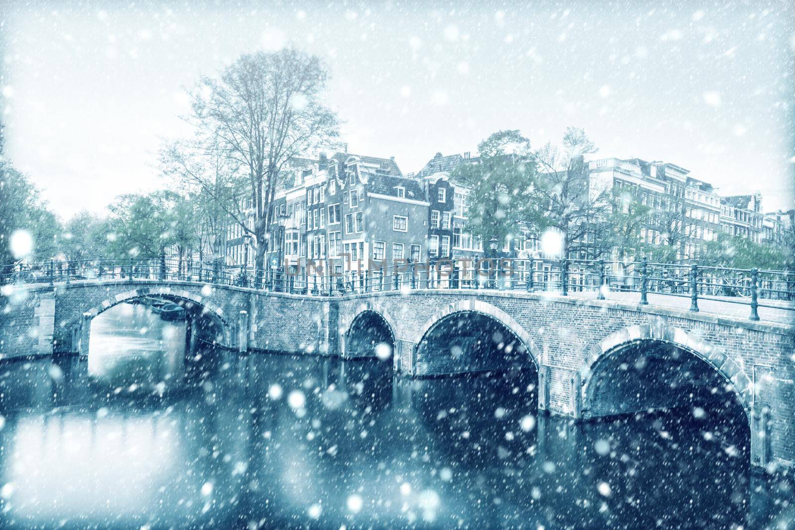 View of Amsterdam canal with snow by cla78