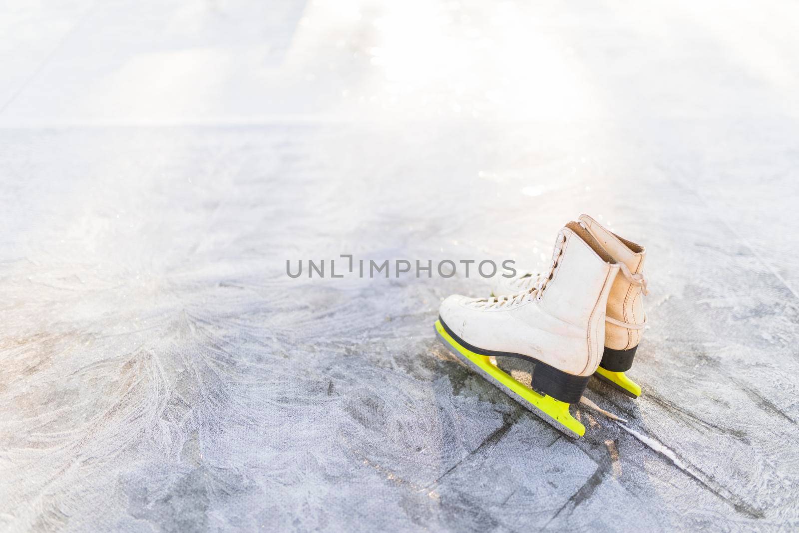 figure skates cracked ice by Zahard