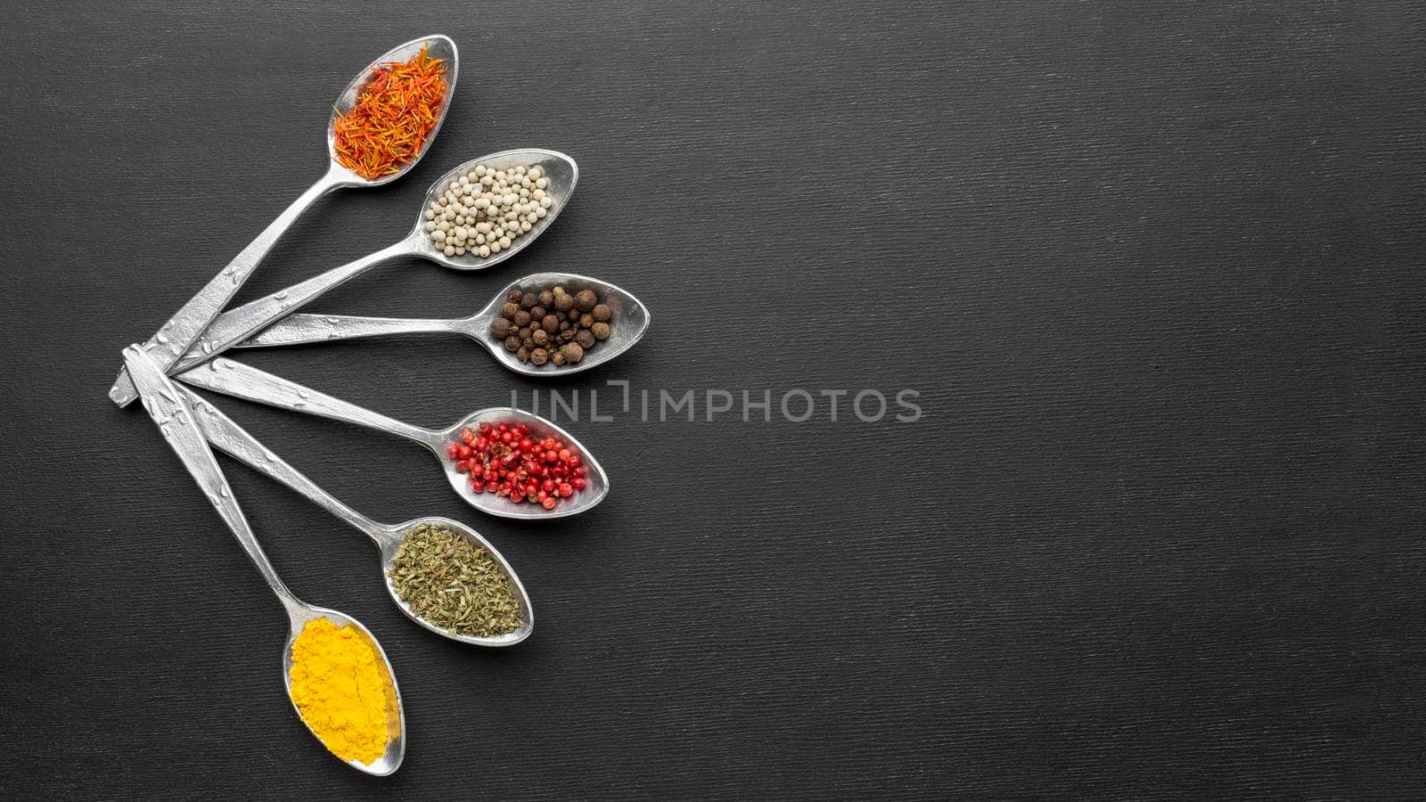 copy space spoons with powder condiments