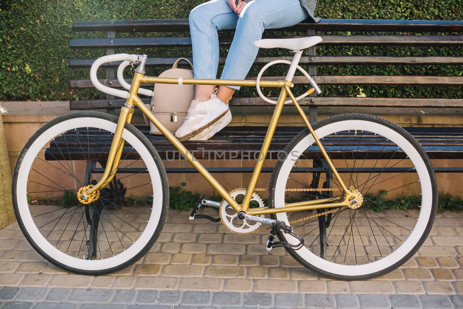 crop woman sitting bench bicycle by Zahard