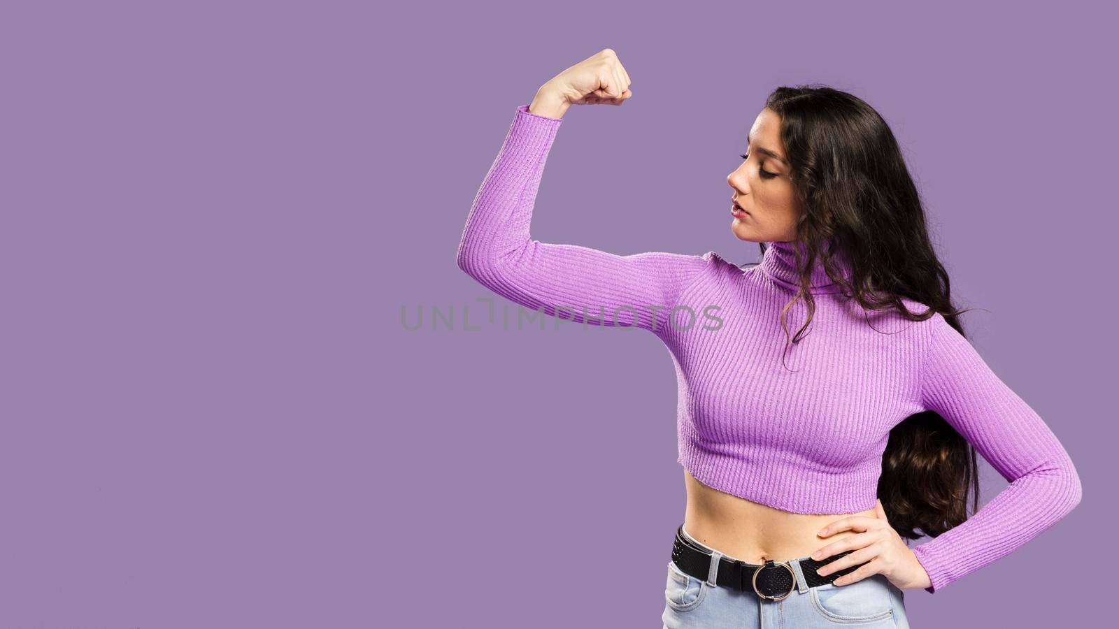 woman showing muscles having violet top sideways by Zahard