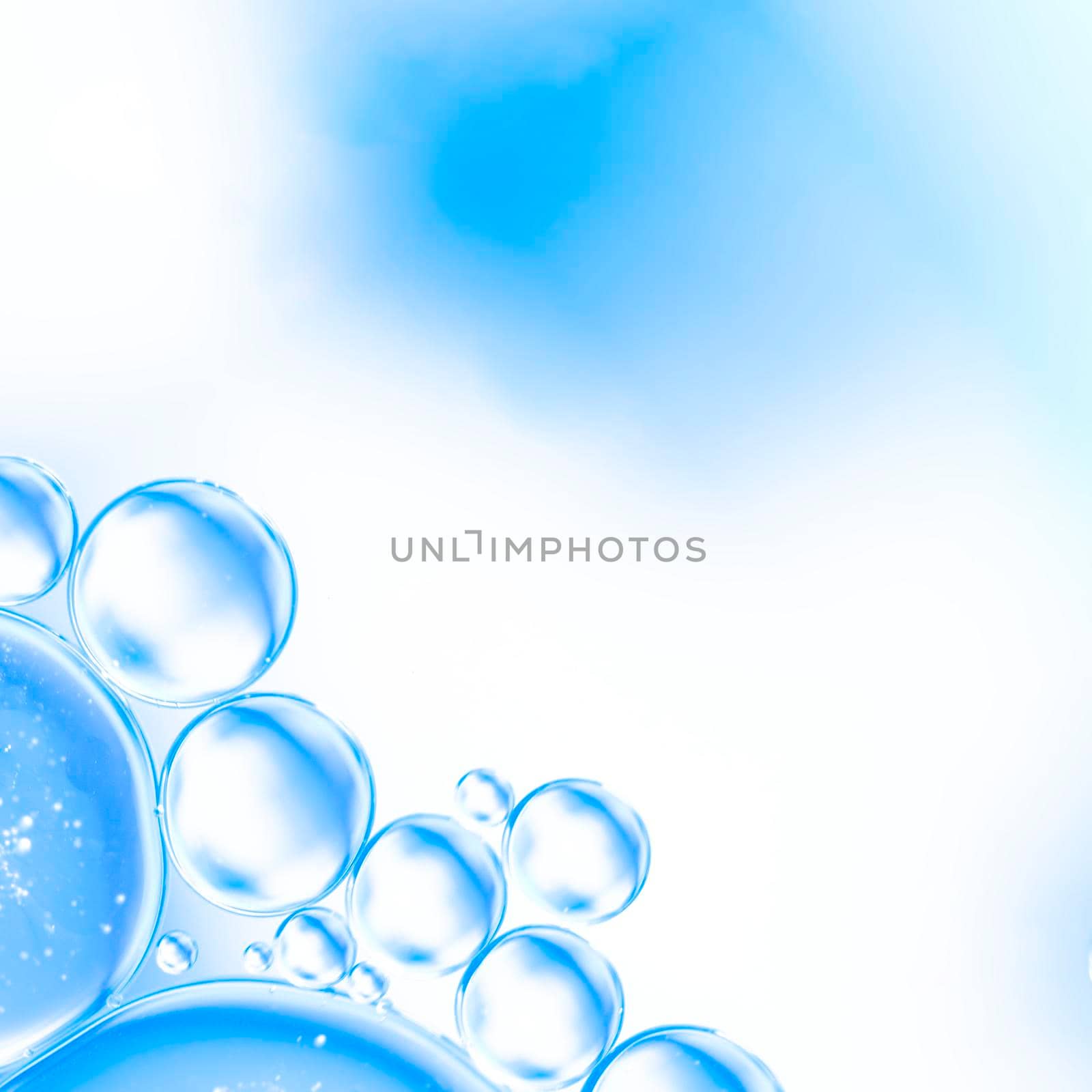 abstract air bubbles water bright cyan blurred background