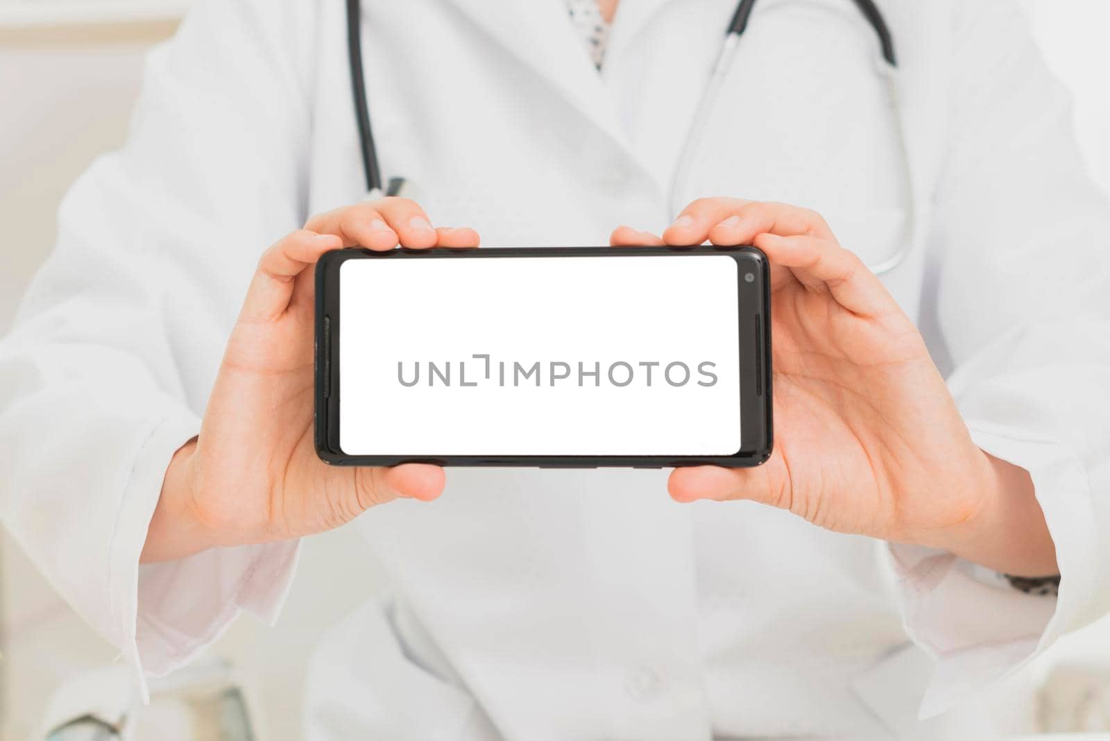 close up doctor holding smartphone mock up by Zahard