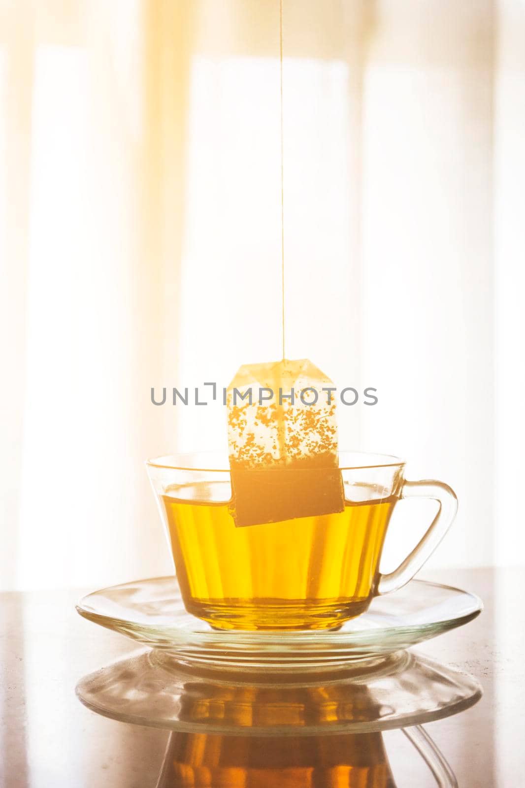 tea bag inside cup by Zahard