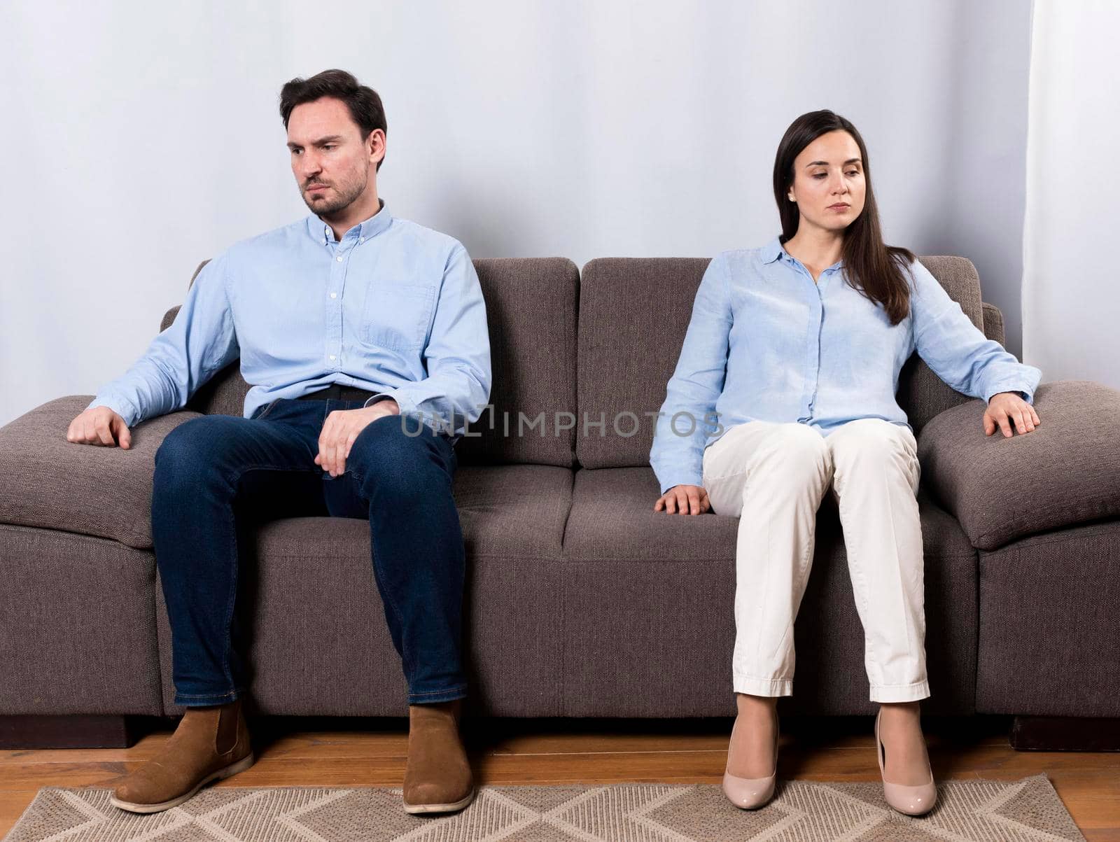 angry male woman sitting couch by Zahard