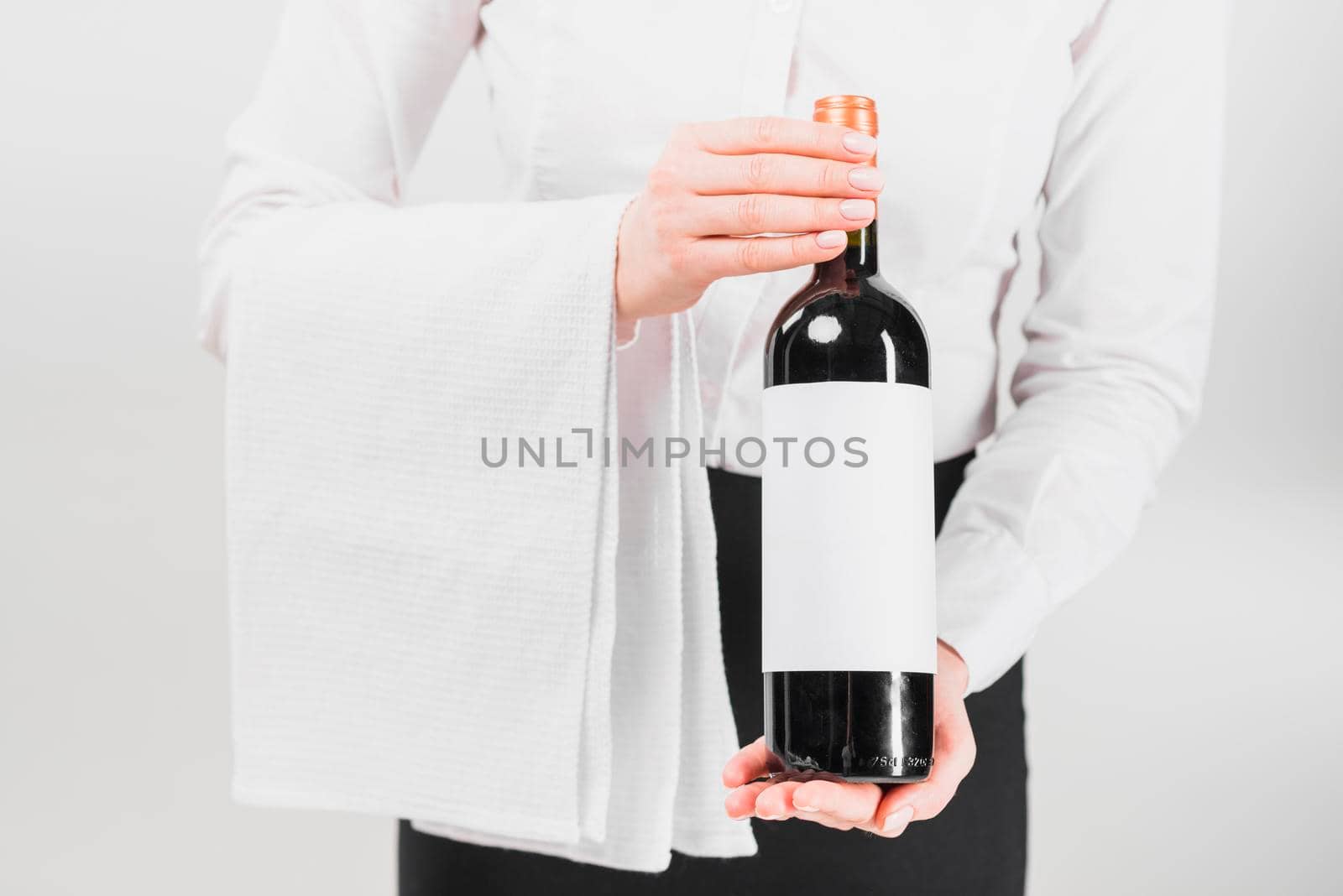 waiter holding offering bottle wine by Zahard