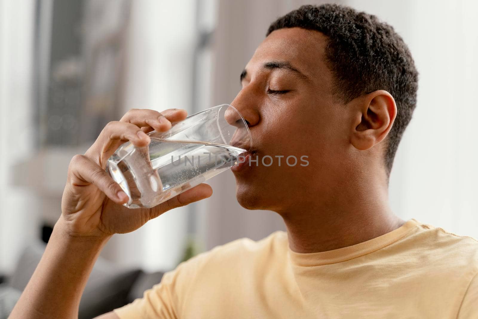 portrait man home drinking glass water by Zahard