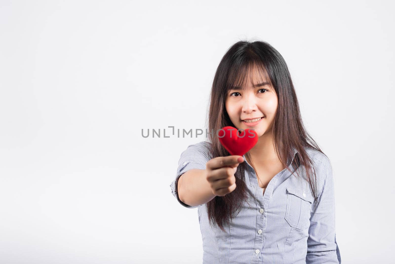 Woman beauty hands holding red heart for giving help donation medical healthcare concept by Sorapop