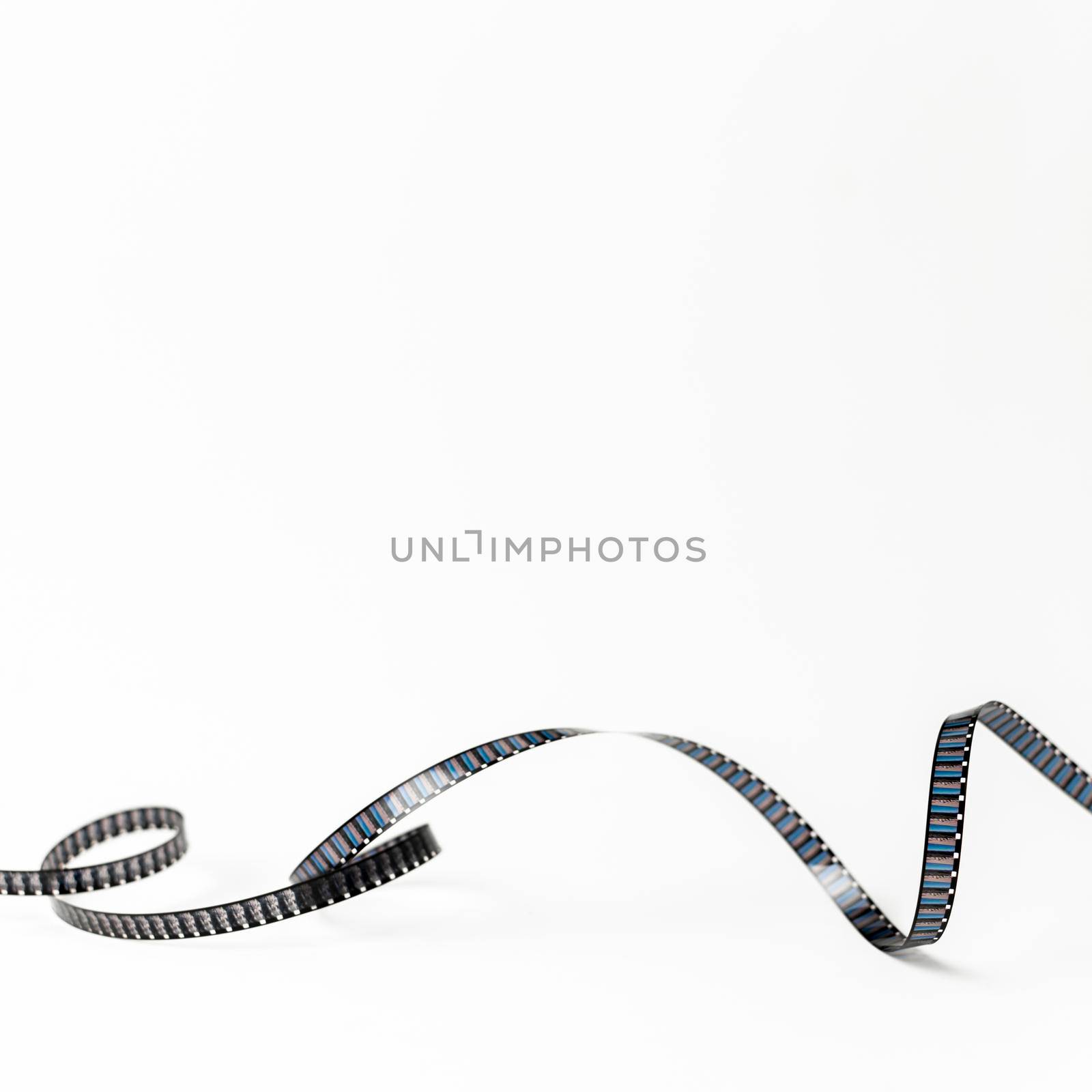 curled film stripes isolated white background by Zahard