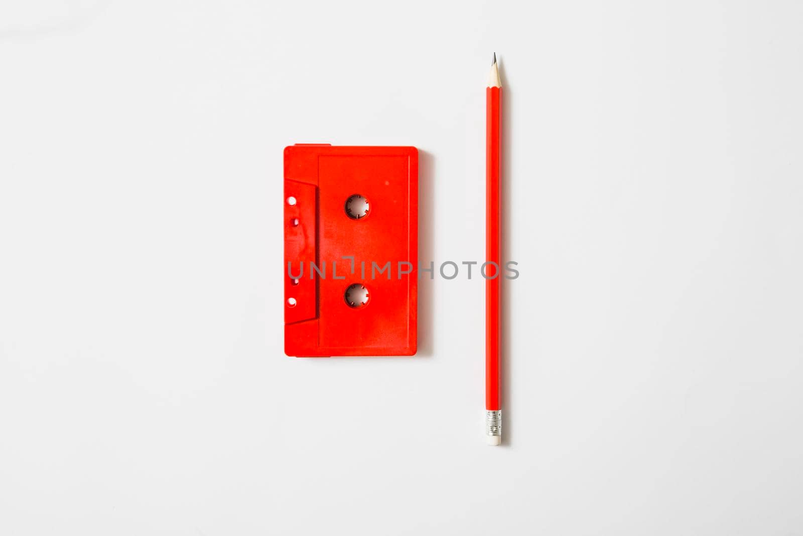 red cassette tape pencil white background by Zahard