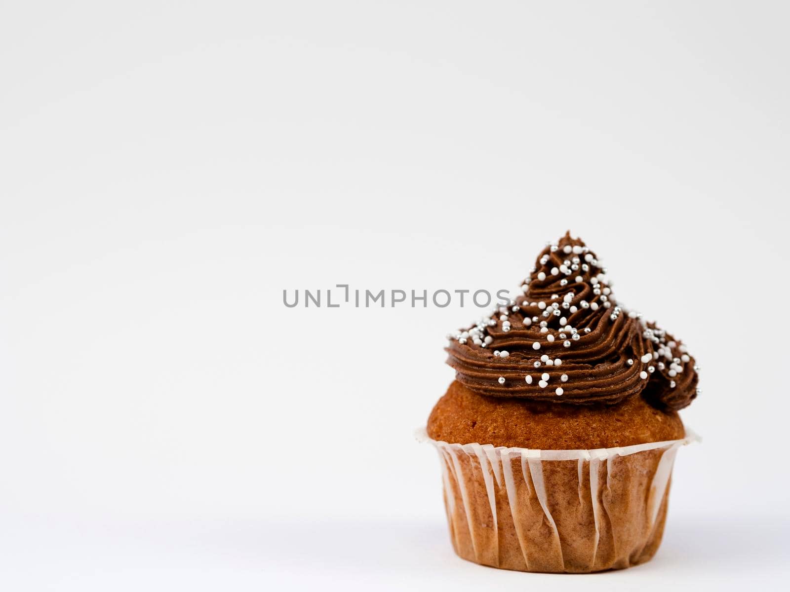 close up delicious muffin white background by Zahard