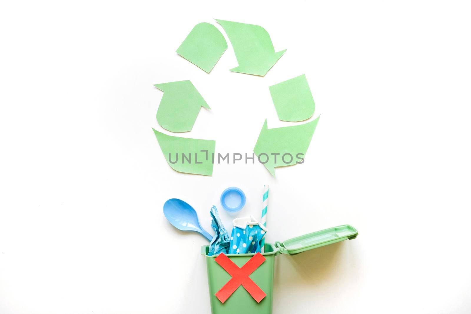 recycle symbol bin with plastic rubbish by Zahard