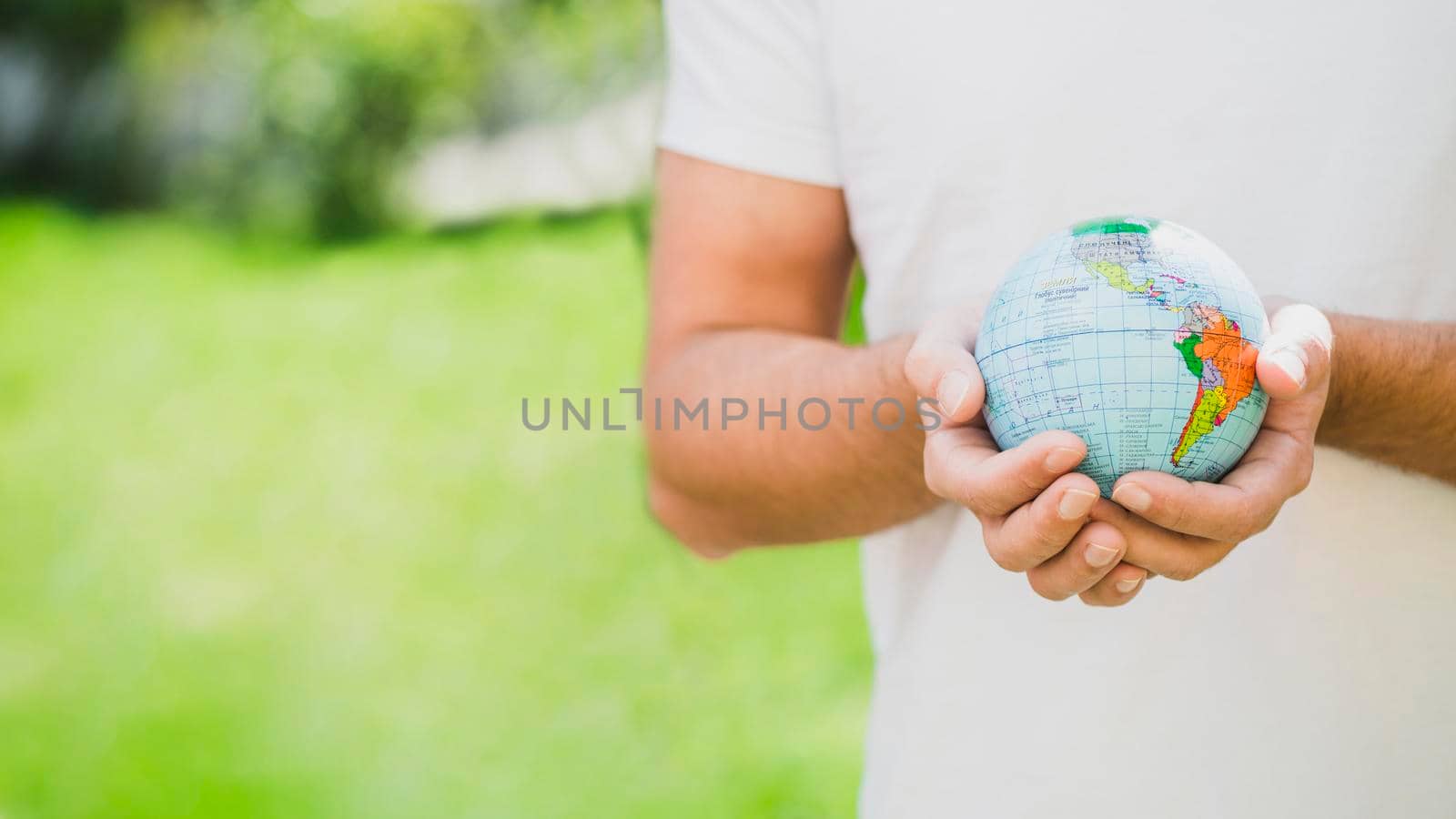 mid section man holding globe hand by Zahard