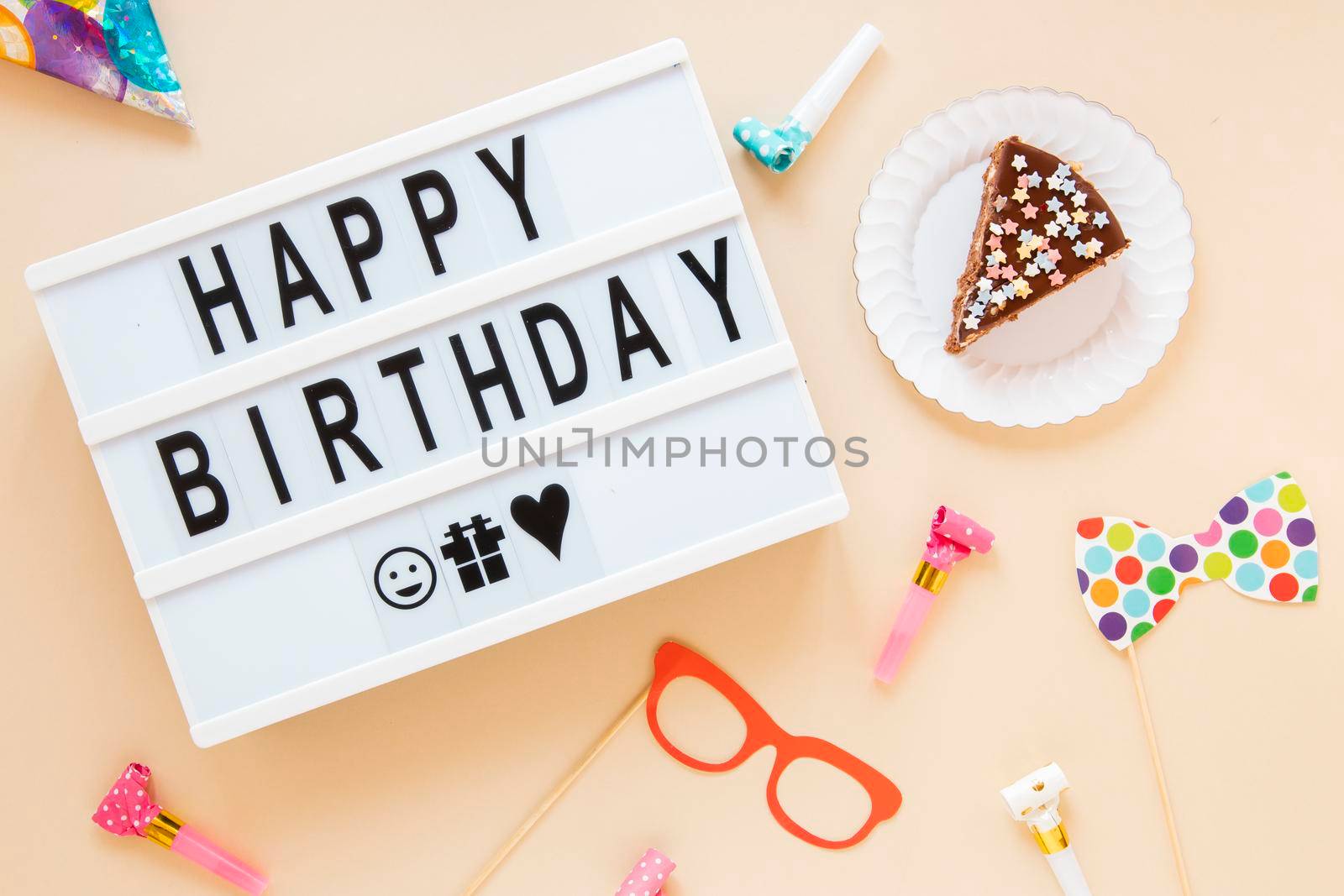 composition with sliced cake birthday lettering