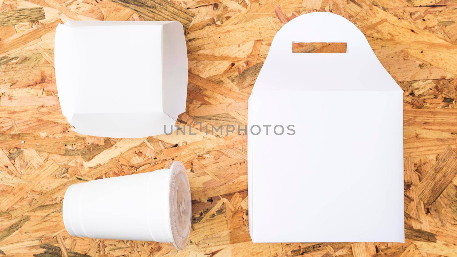 white takeaway food wooden textured backdrop by Zahard