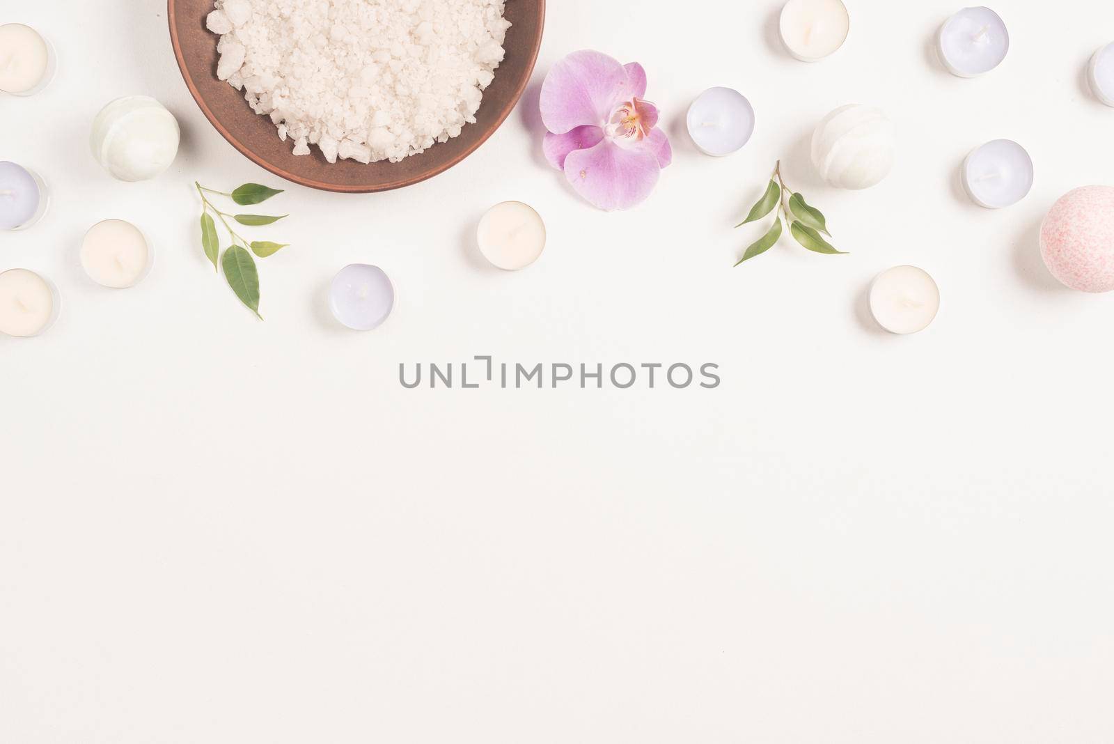 sea salt orchid flower with candles white background forming top border by Zahard