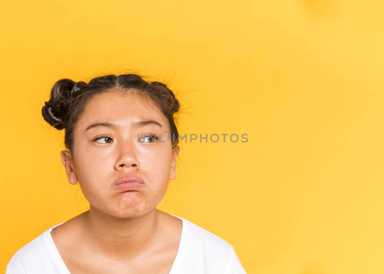 sad asian woman with tied hair copy space by Zahard