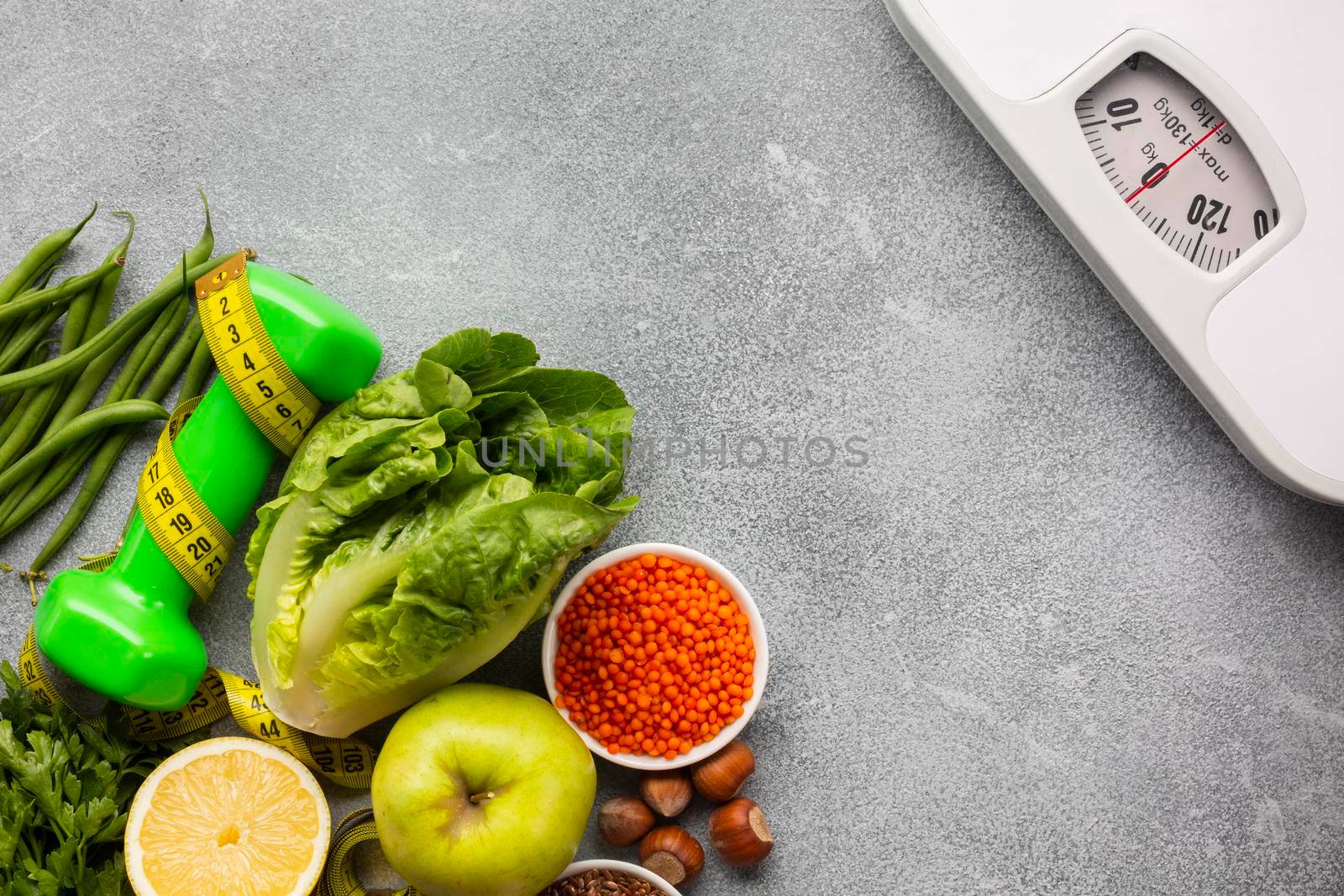 scale with groceries gray background by Zahard