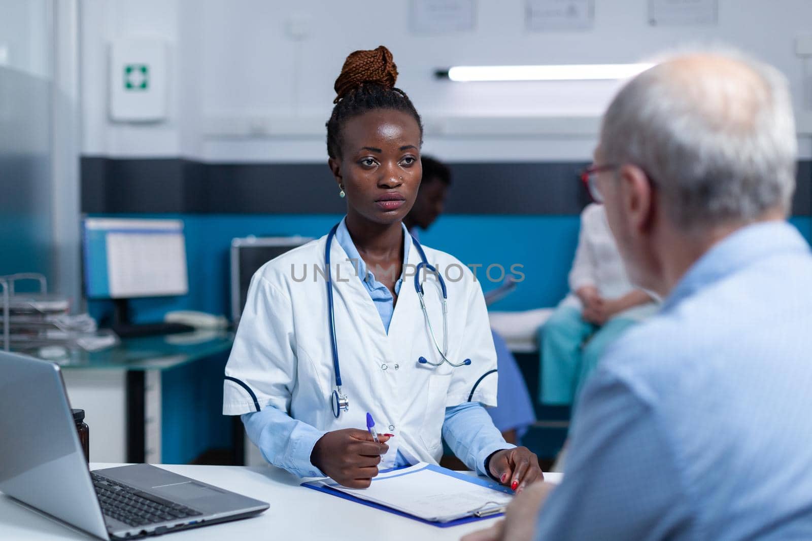 Healthcare physician expert talking to senior patient about health hazards and treatment benefits. Clinic medic specialist speaking about checkup appointment, prescribed medicine and consultation results