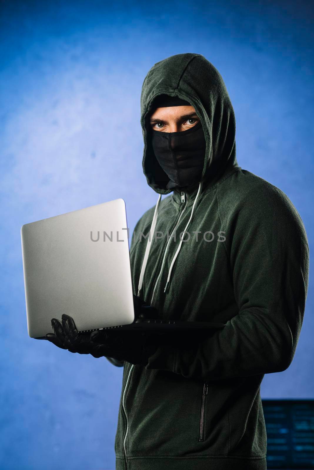 hacker with laptop by Zahard