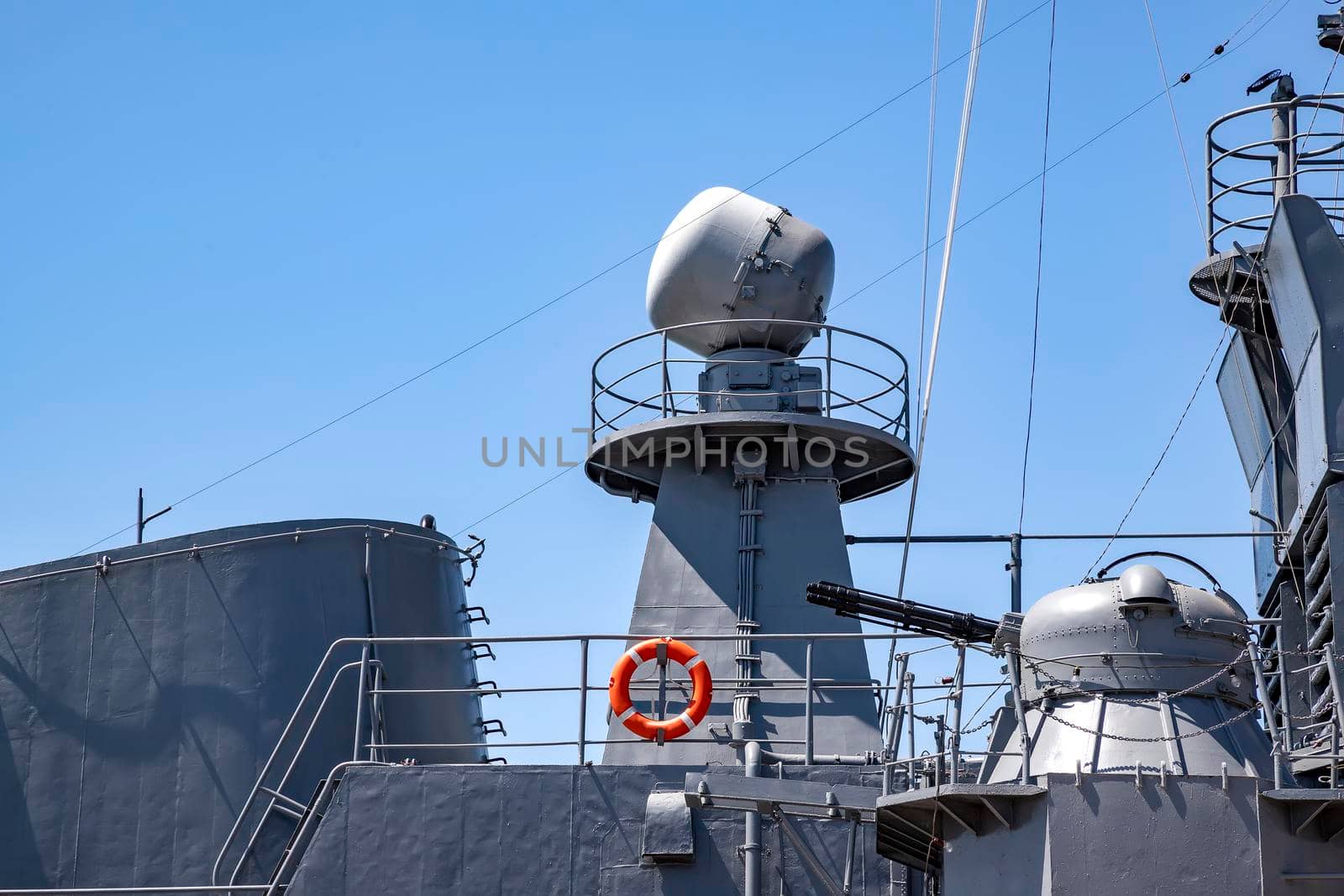 A part of the modern military navy ship. Military sea landscape with clear sky