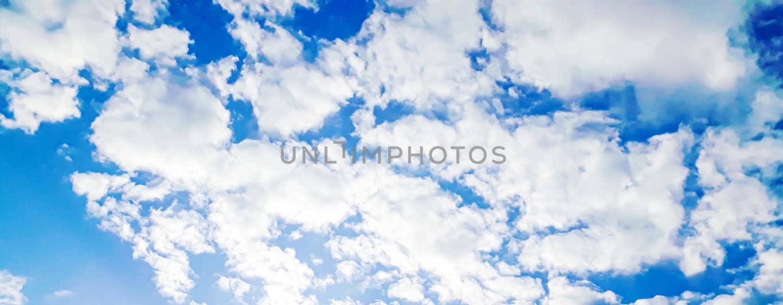 Blue sky with clouds selective focus nature
