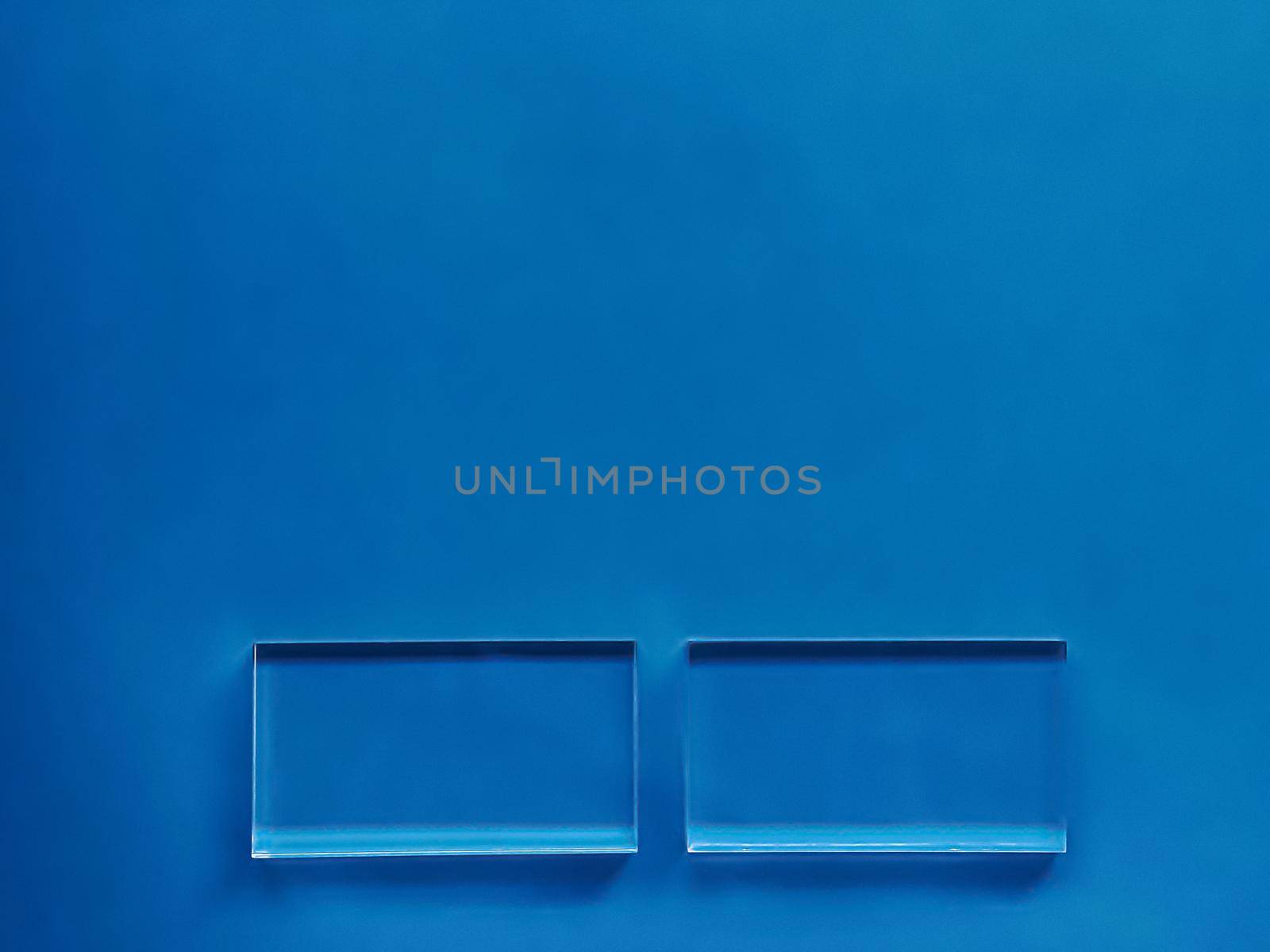 Transparent glass device on blue background, future technology and abstract screen mockup design concept