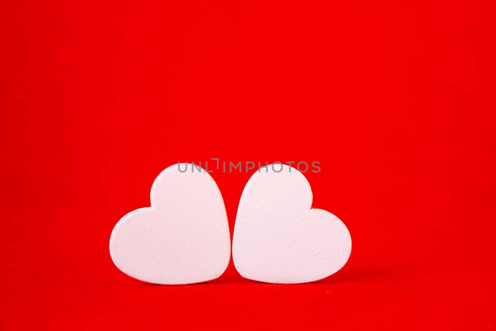 Hearts on a red background. Valentine's Day. Selective focus. Valentine.