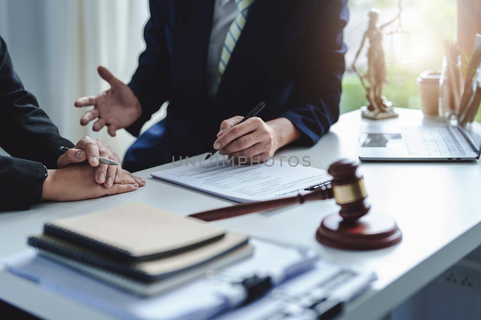 Law, Consultation, Agreement, Contract, Attorney or Lawyer holding a pen is consulting with a client to explain the pattern of answering questions before going to court to decide a lawsuit