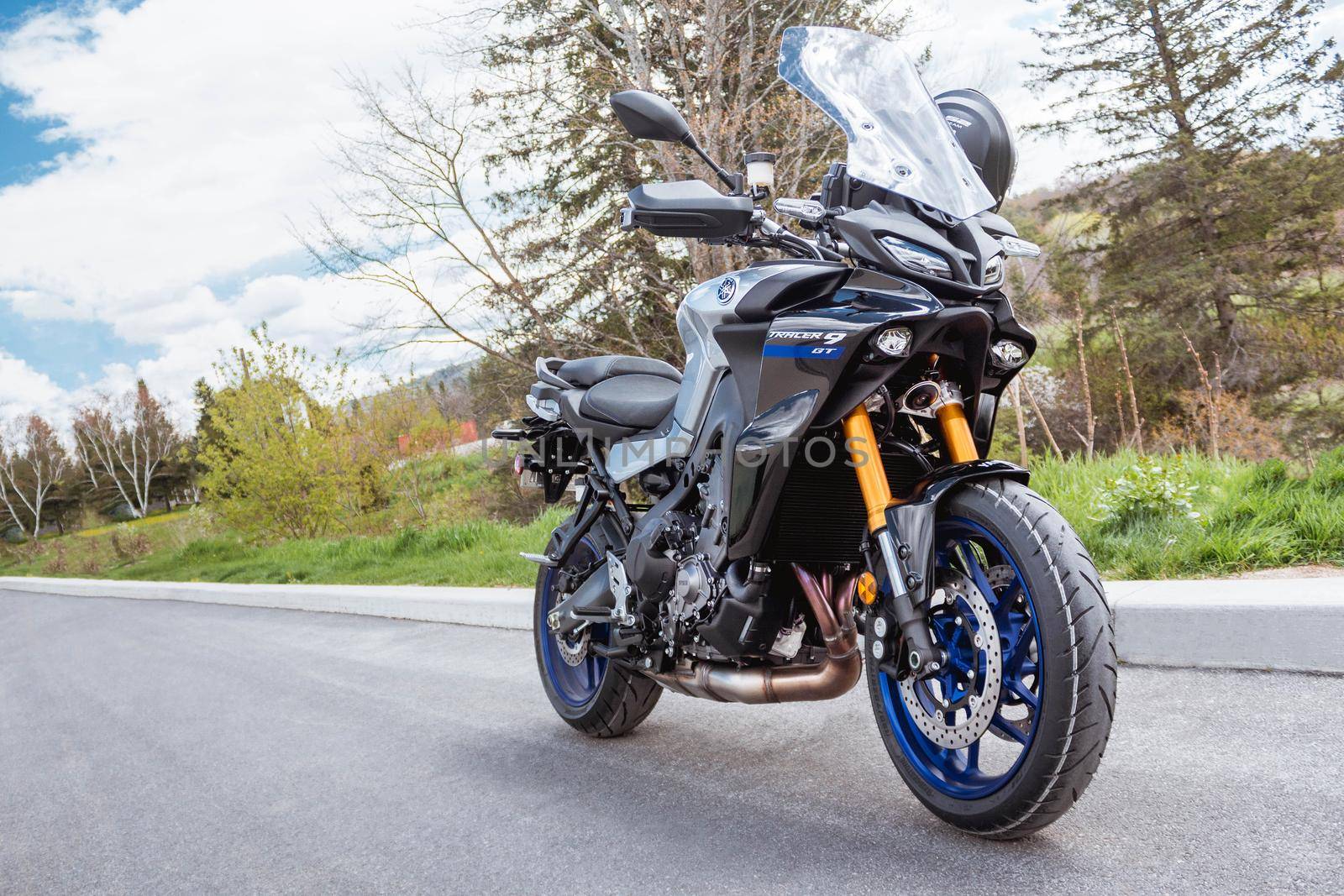 Gatineau, Quebec Canada - May 9, 2021 : View of new Yamaha Tracer 9 GT motorcycle. Space for text. Beautiful background with yamaha bike by JuliaDorian