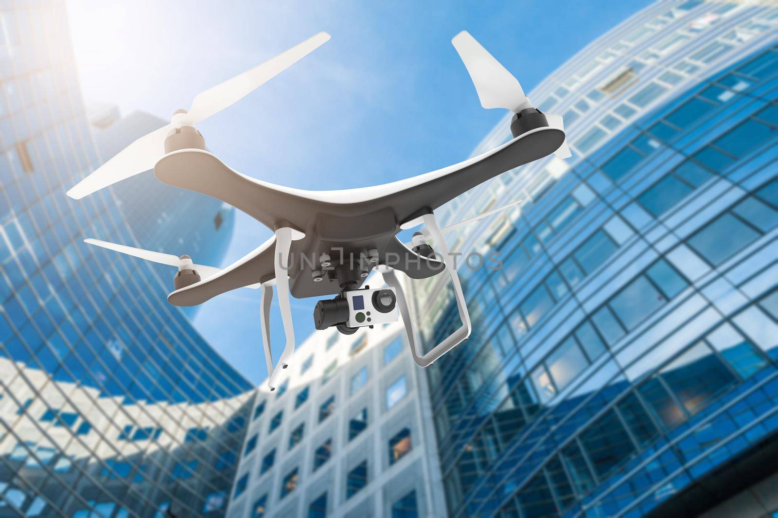 Drone with digital camera flying in a modern city by cla78