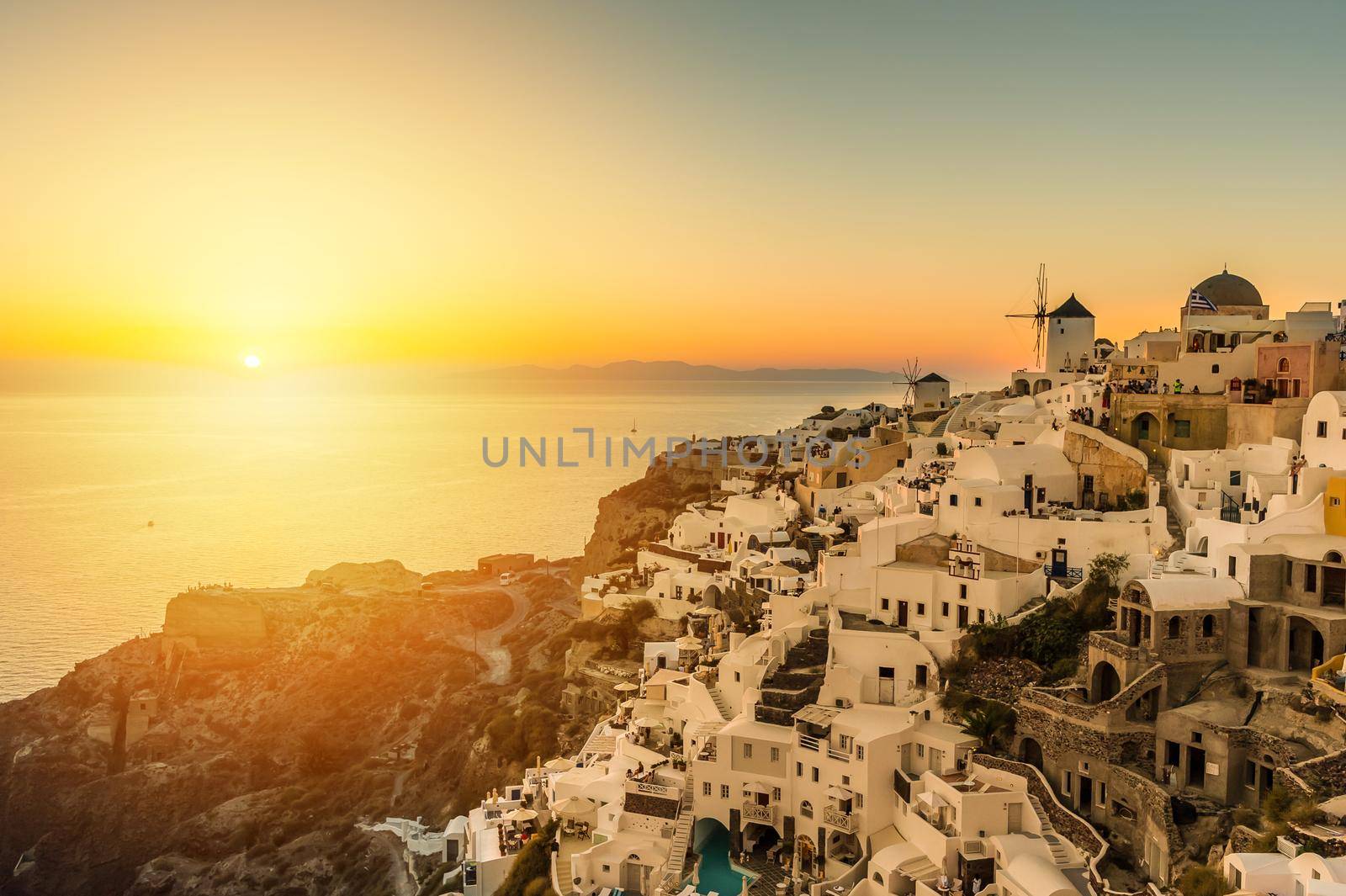 Sunset over Oia village in Santorini - Greece