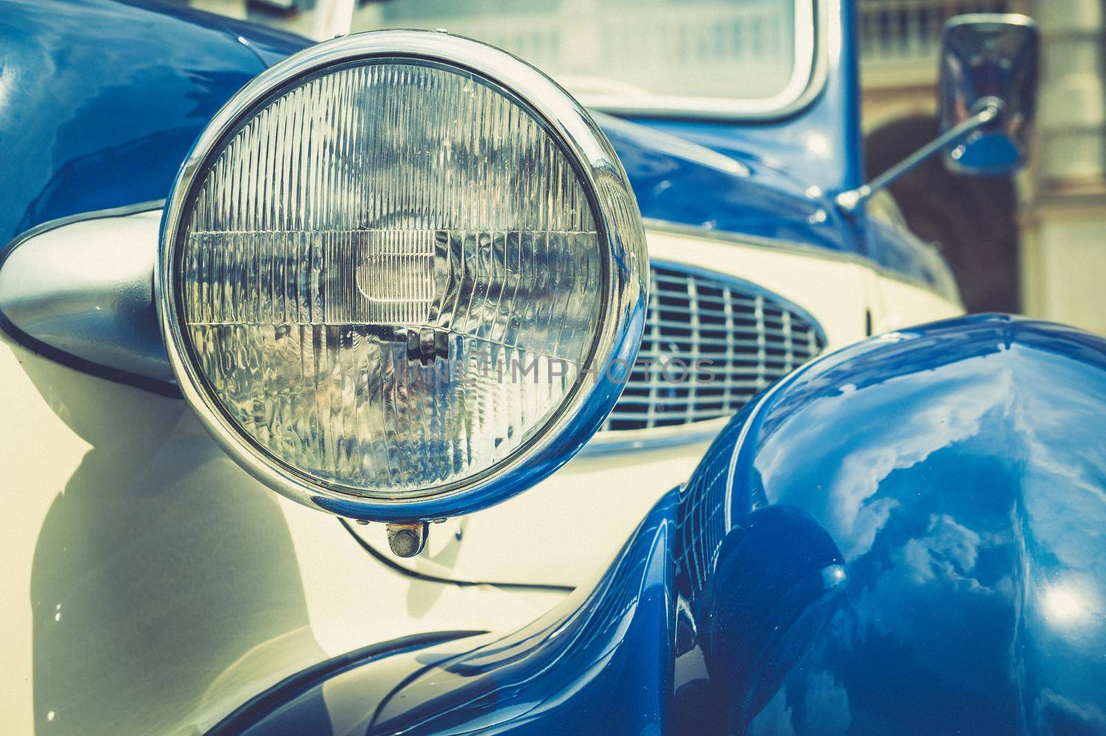 Vintage classic car front view with headlight