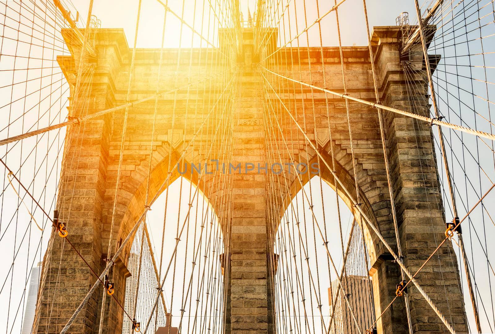 Close up on Brooklyn Bridge in the sunset, New York