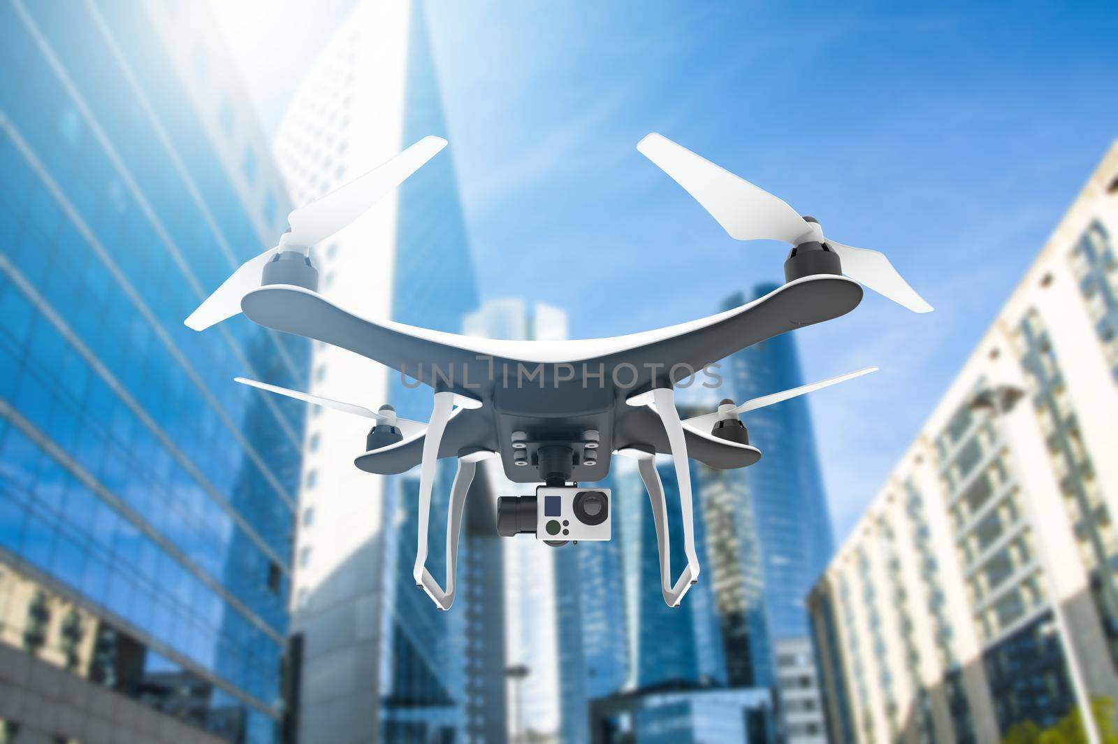 Drone with digital camera flying in a modern city with sunlight by cla78