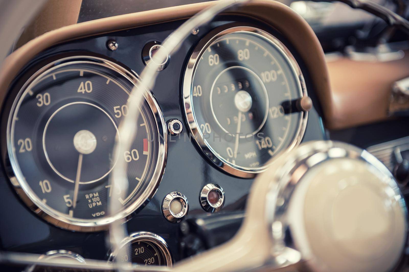 Close up on a dashboard of a vintage car