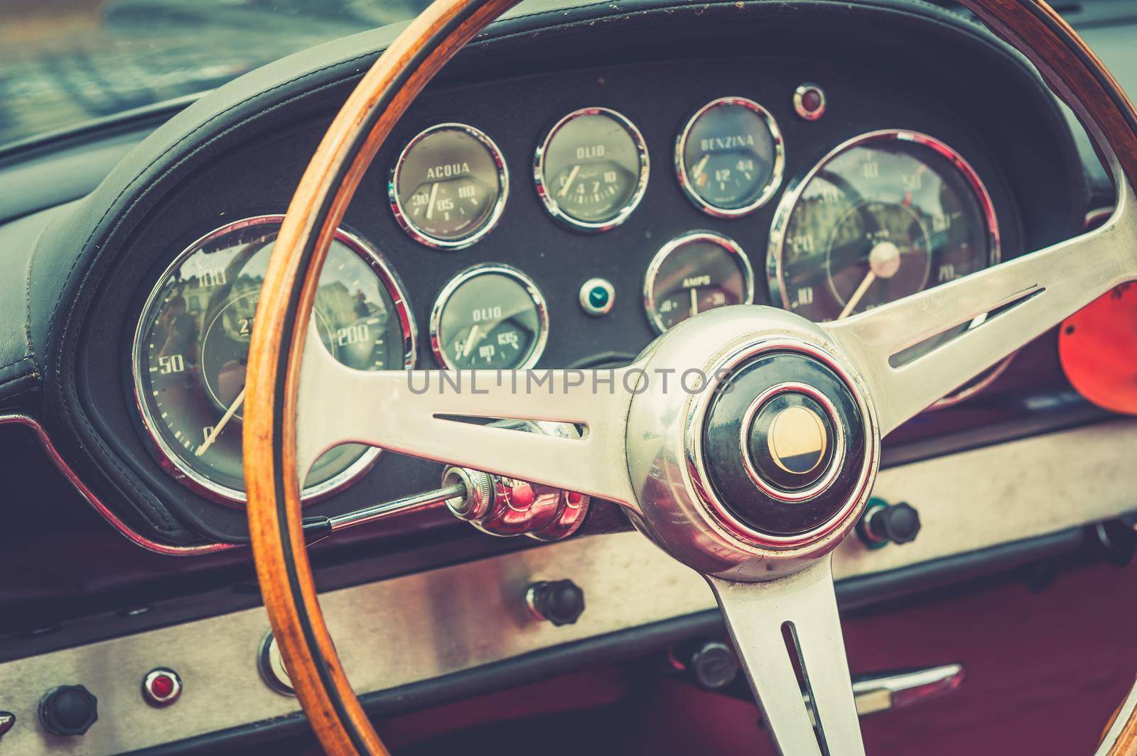 Inside of a luxury vintage car with cross process effect