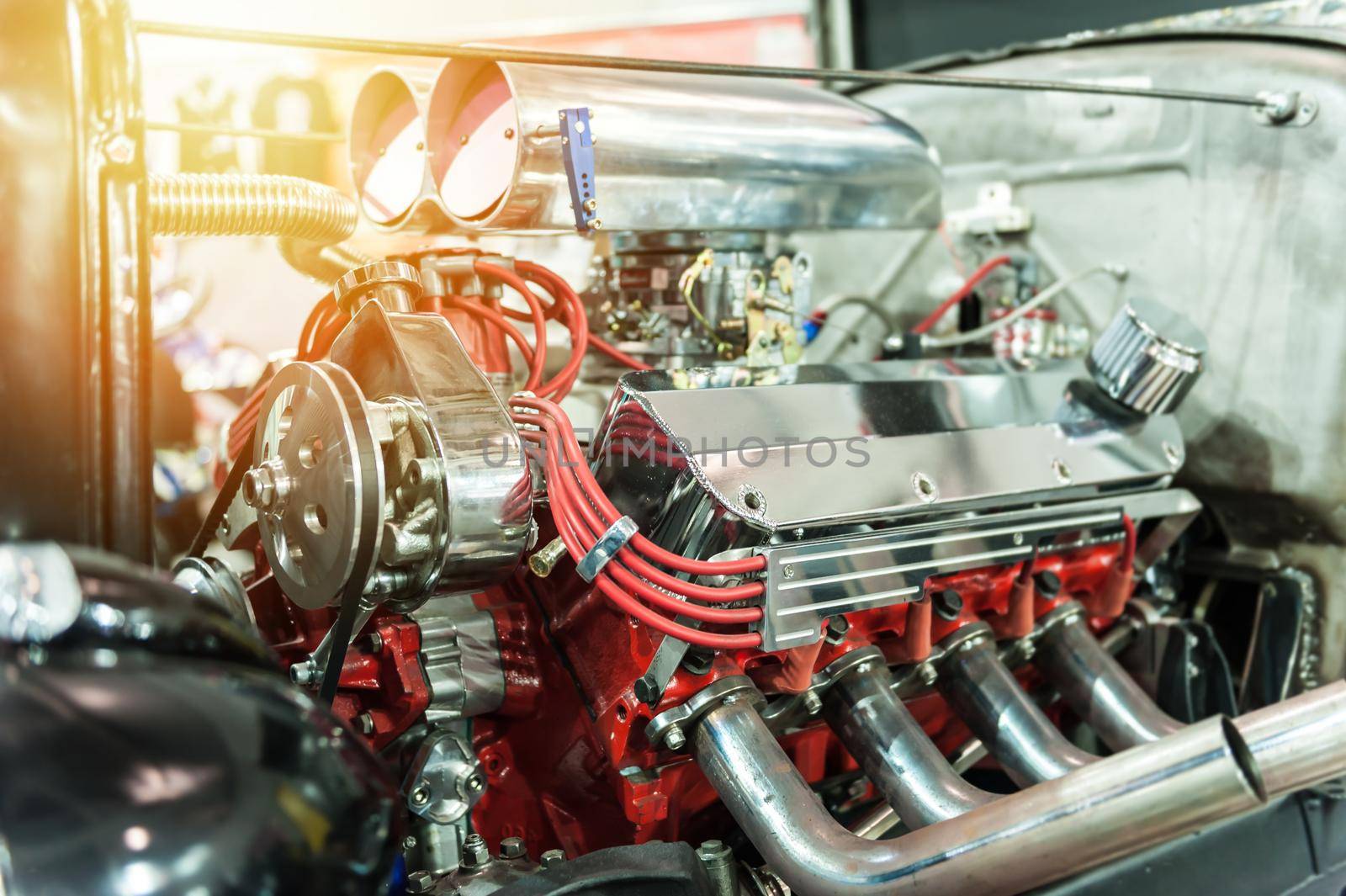 Engine of a hot rod in the sunlight