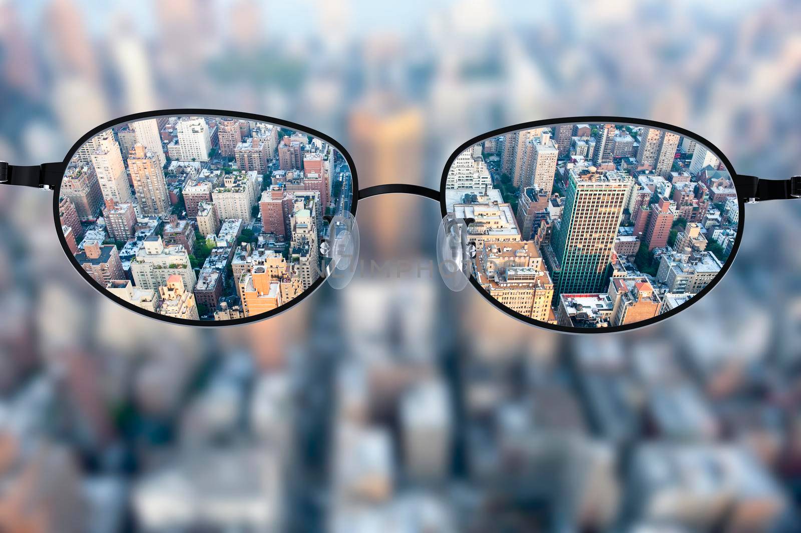 Clear cityscape focused in glasses lenses by cla78