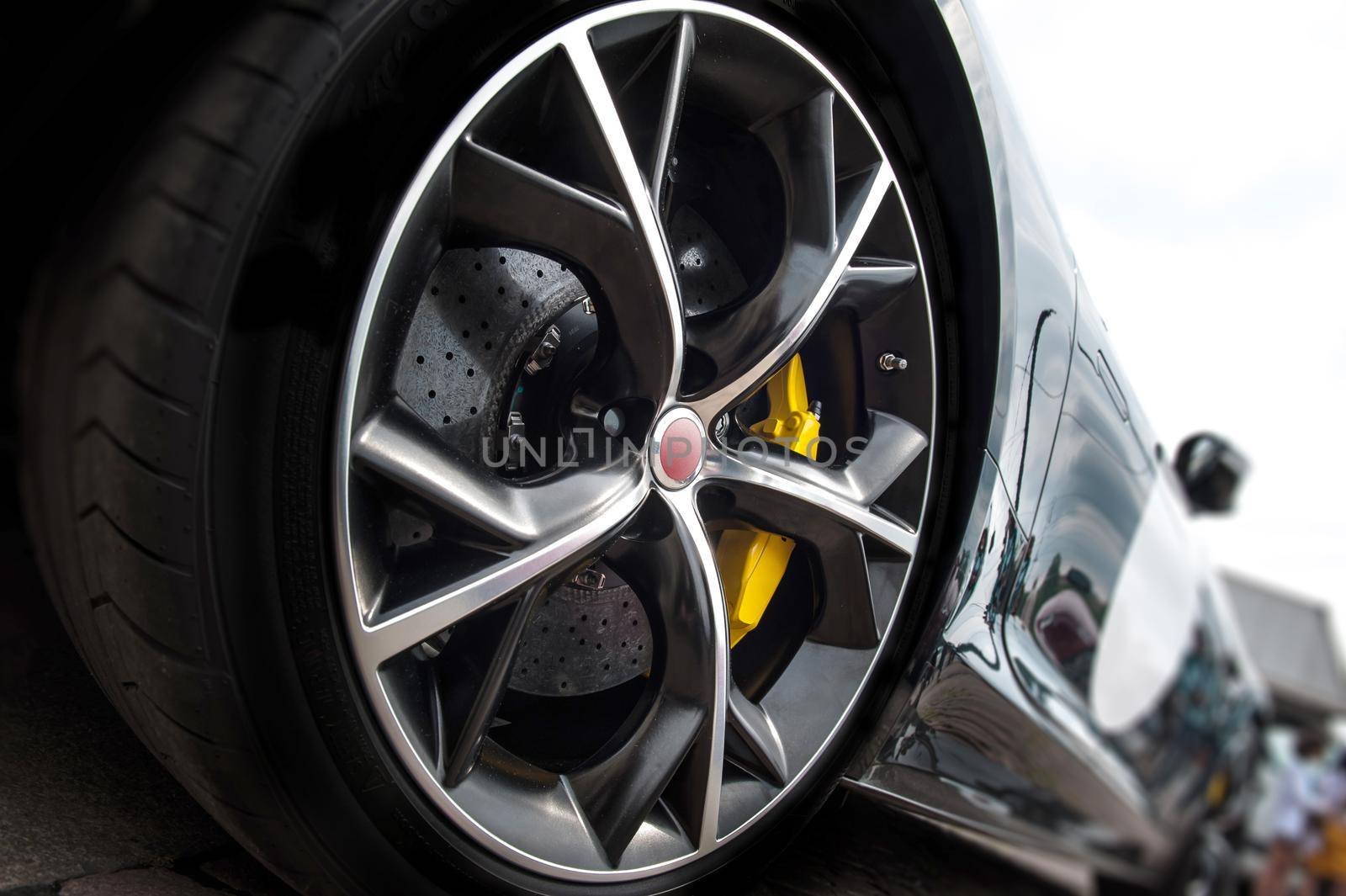 Close up of a tire of a black car