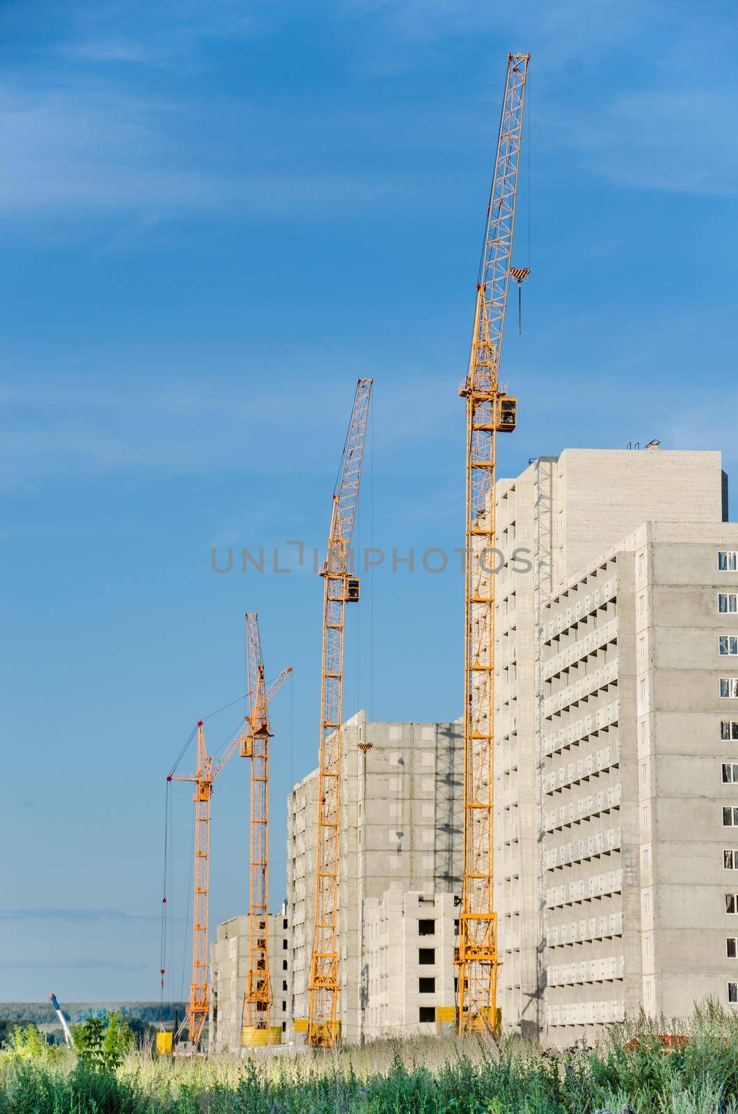 Construction site with cranes.