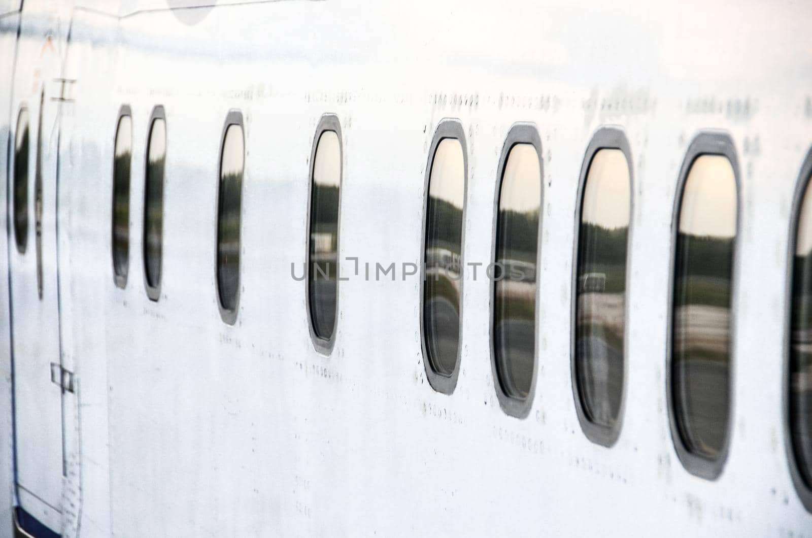 Closeup of plane's window by Proff