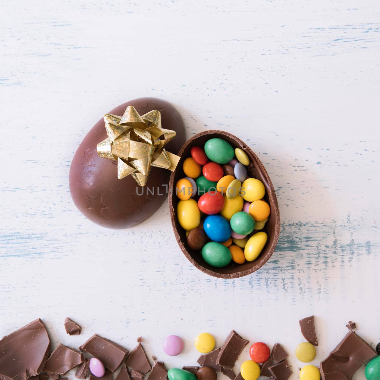 close up egg with candies bow