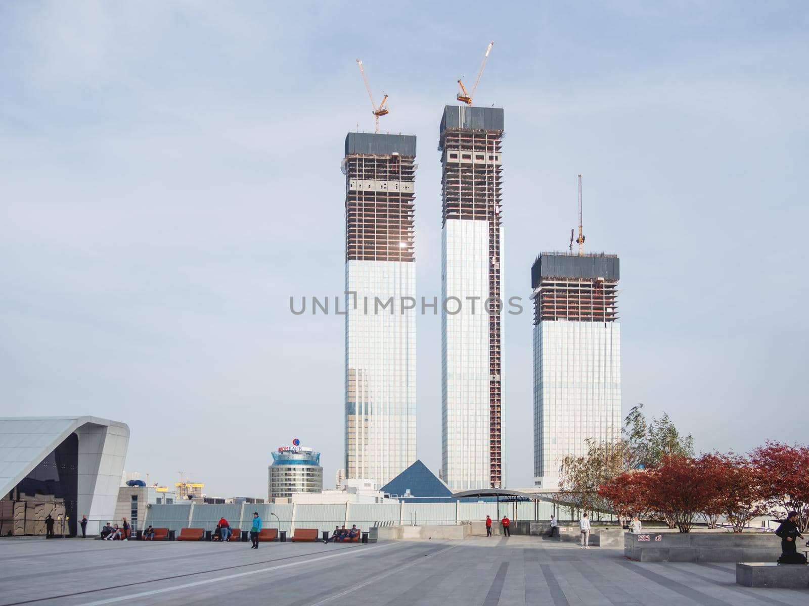 MOSCOW, RUSSIA - October 03, 2020. View on construction site of Capital Group towers from Moscow International Business Center MIBC . Building structure of new tower. by aksenovko