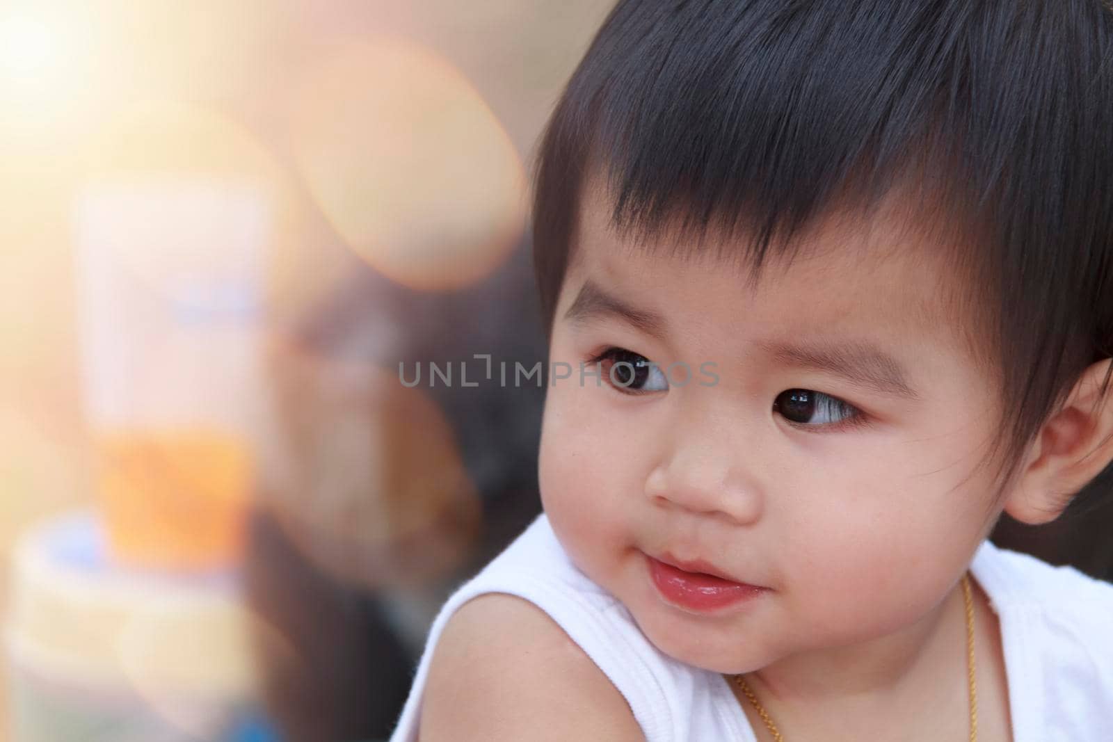 Close up happy smiling little girl. Portrait cute child baby girl. Positive female little baby. Close up face portrait of happy positive smiling cheerful little girl.