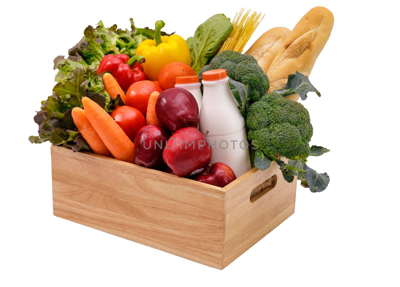 Wooden crate with multi collor vegetables , fruit, milk and baguette isolated on white background. Grocery in wood crate . Save with clipping path